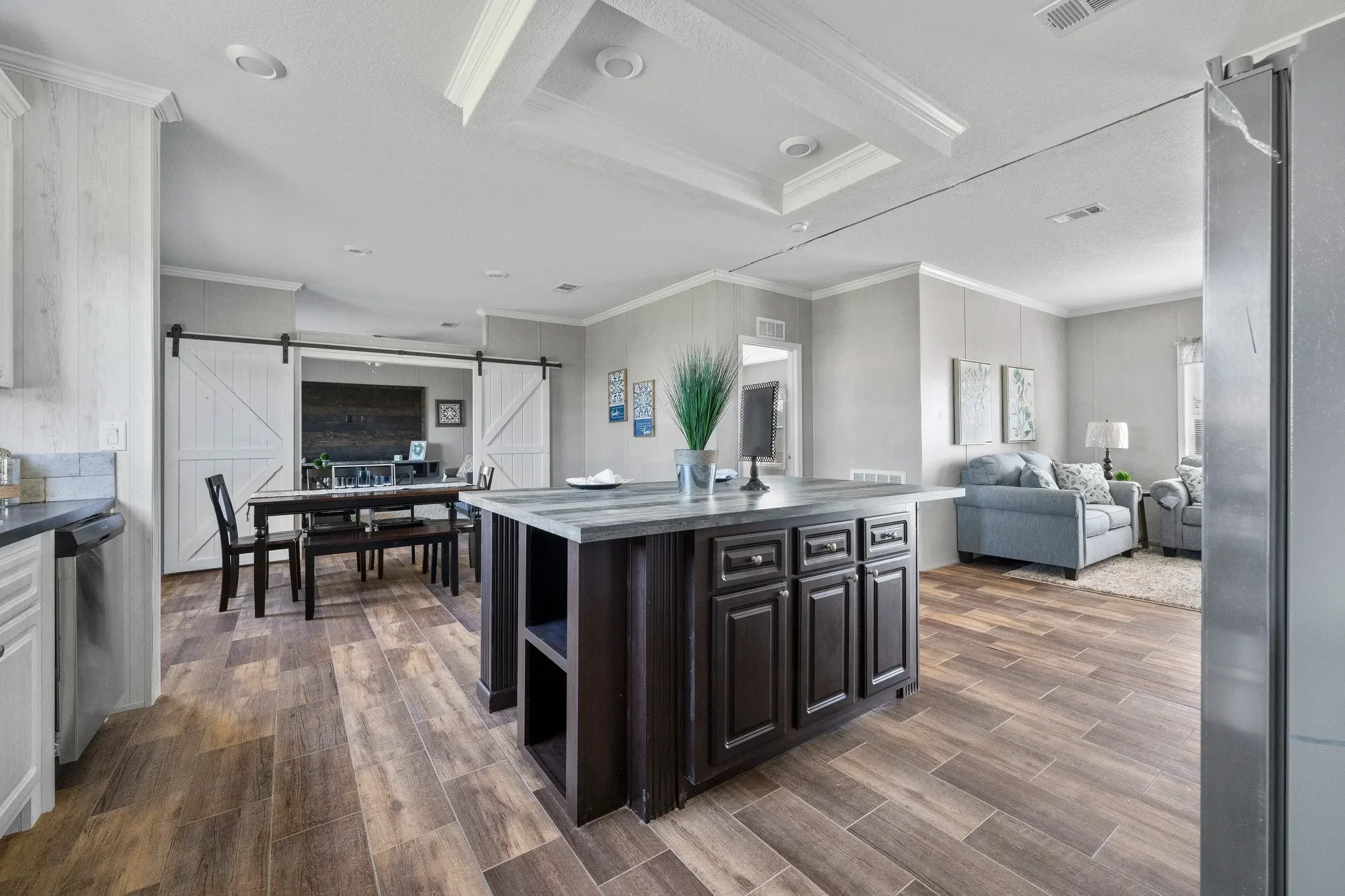 Keaton model open living space in a factory-built home sold by Diamond Homes Center in East Palatka, Florida