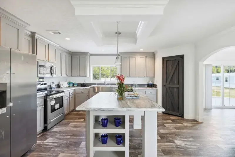 Freedom model kitchen in a manufactured home sold by Diamond Homes Center in Northeast Florida, financed through BuildBuyRefi.com