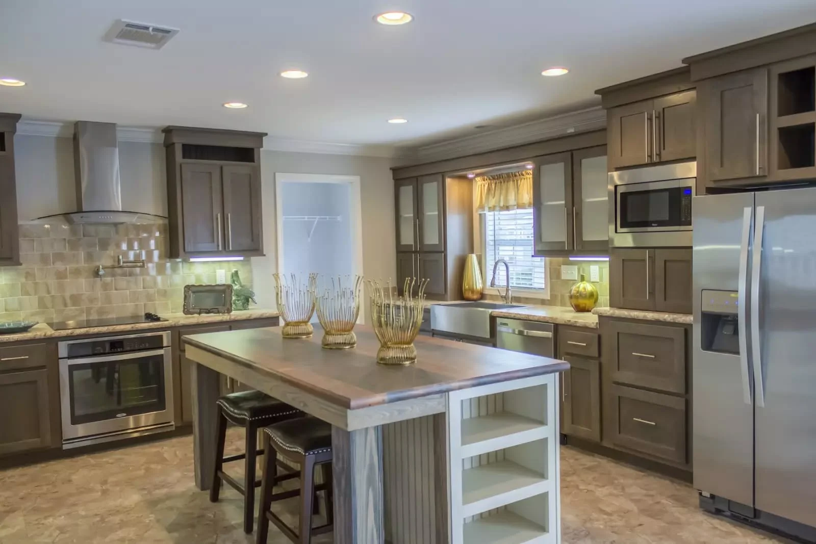 Primary kitchen in a new home from Quality Mobile Homes in Jacksonville, Florida, financed through BuildBuyRefi.com