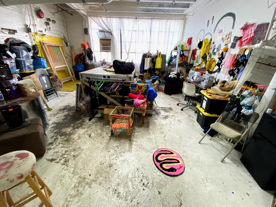 GAUDMOTHER studio with textile work, tools, and works in progress