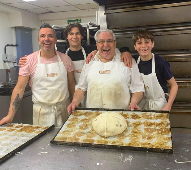 "It was great fun this #goodfriday working at our shop with 3 generations making the #hotcrossbuns I just loved this picture #easter #family #dad #grandad"