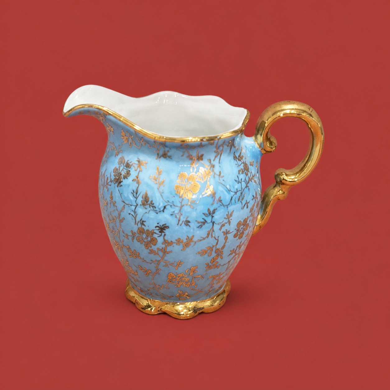 Blue-and-Gold Porcelain Creamer by Maker unrecorded