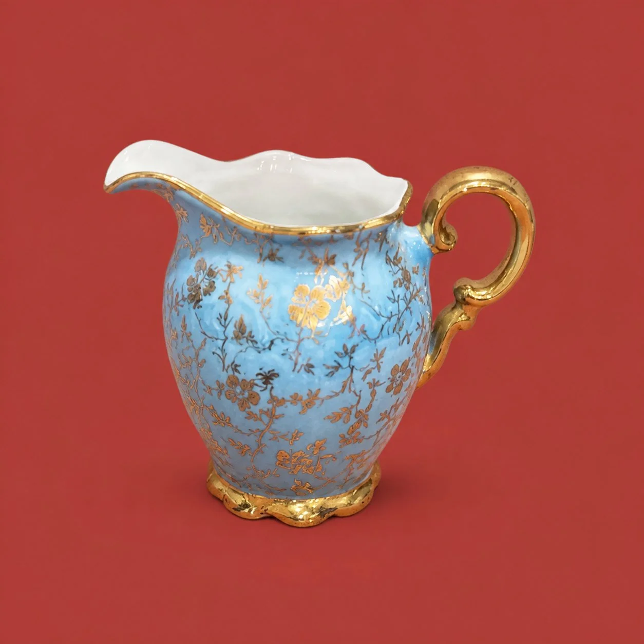 Blue-and-Gold Porcelain Creamer by Maker unrecorded