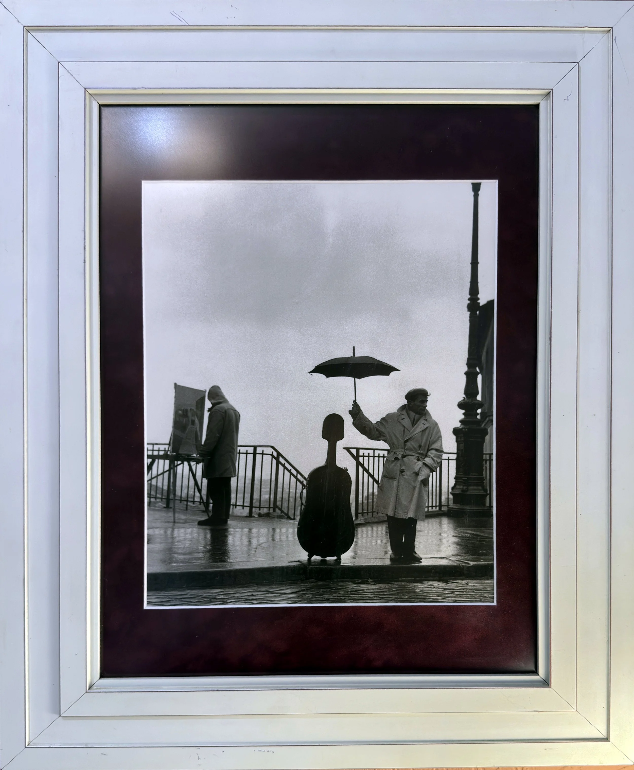 Le violoncelle sous la pluie (The Cello in the Rain), also known as Musician in the Rain by Robert Doisneau
