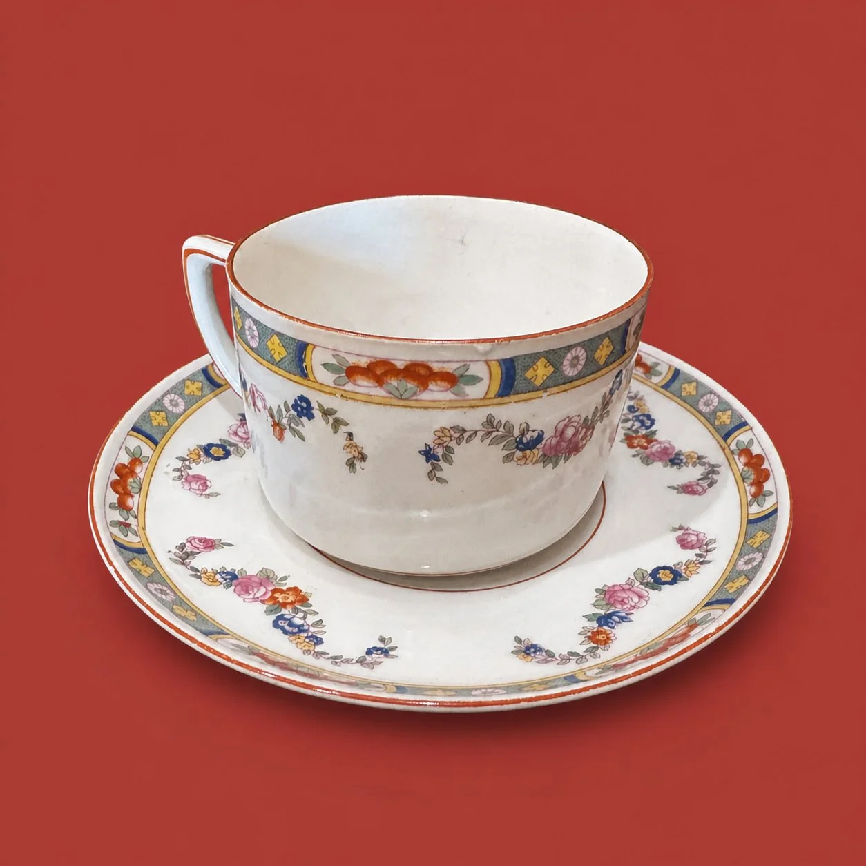 Floral Teacup and Saucer by Maker unrecorded