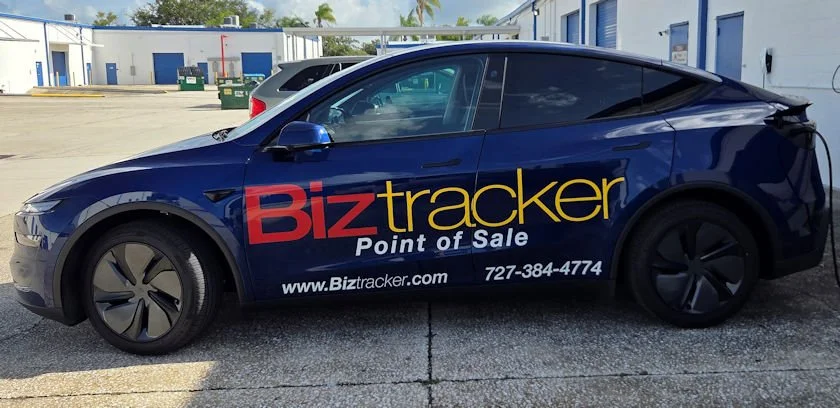 BizTracker branded local POS service vehicle used for installation and support throughout Tampa Bay