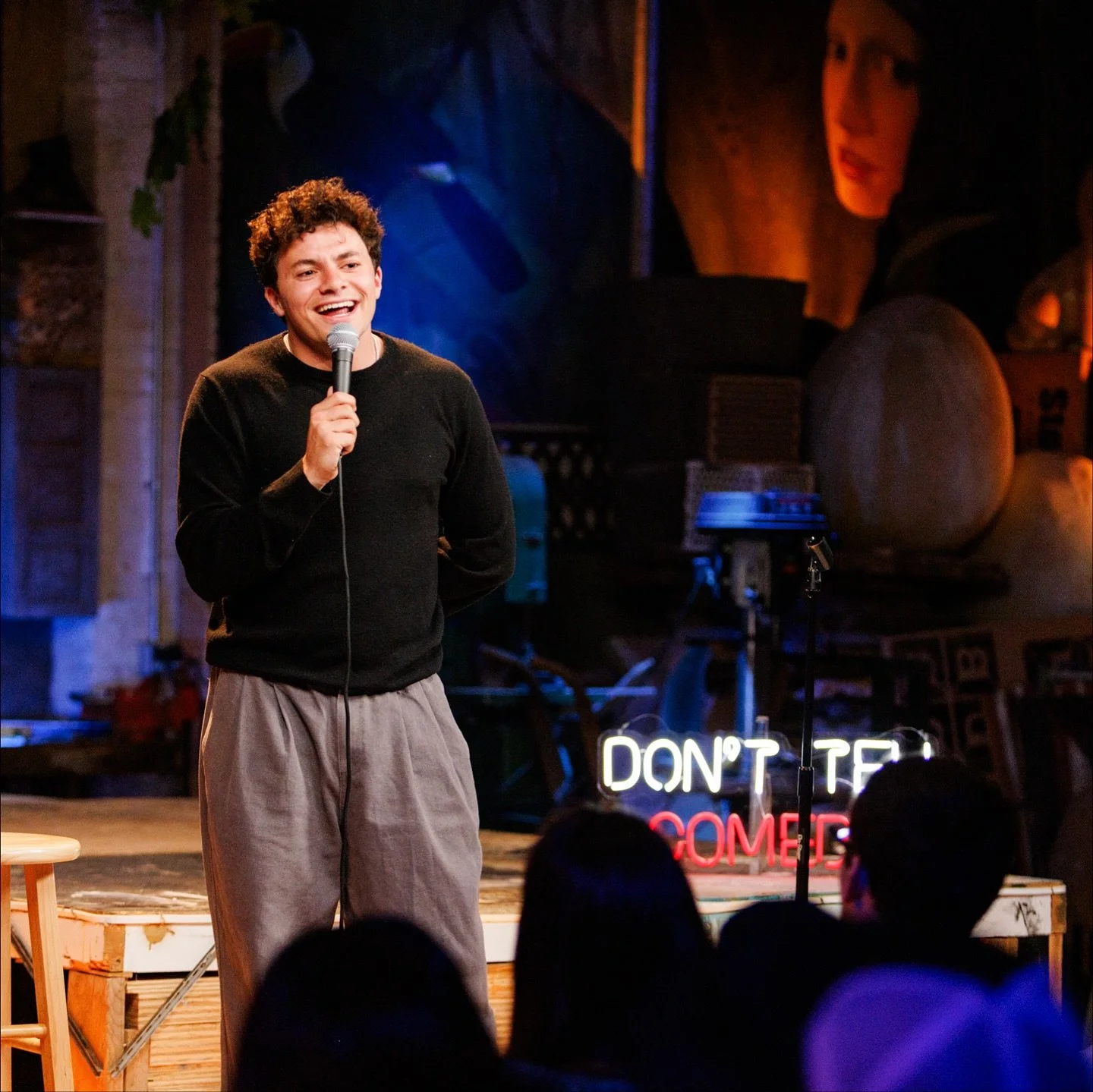 Simon performing on stage