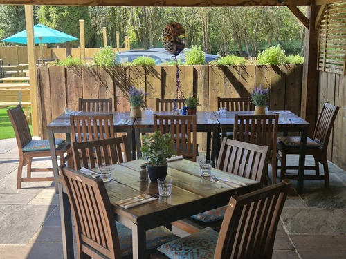 Tables on the covered terrace