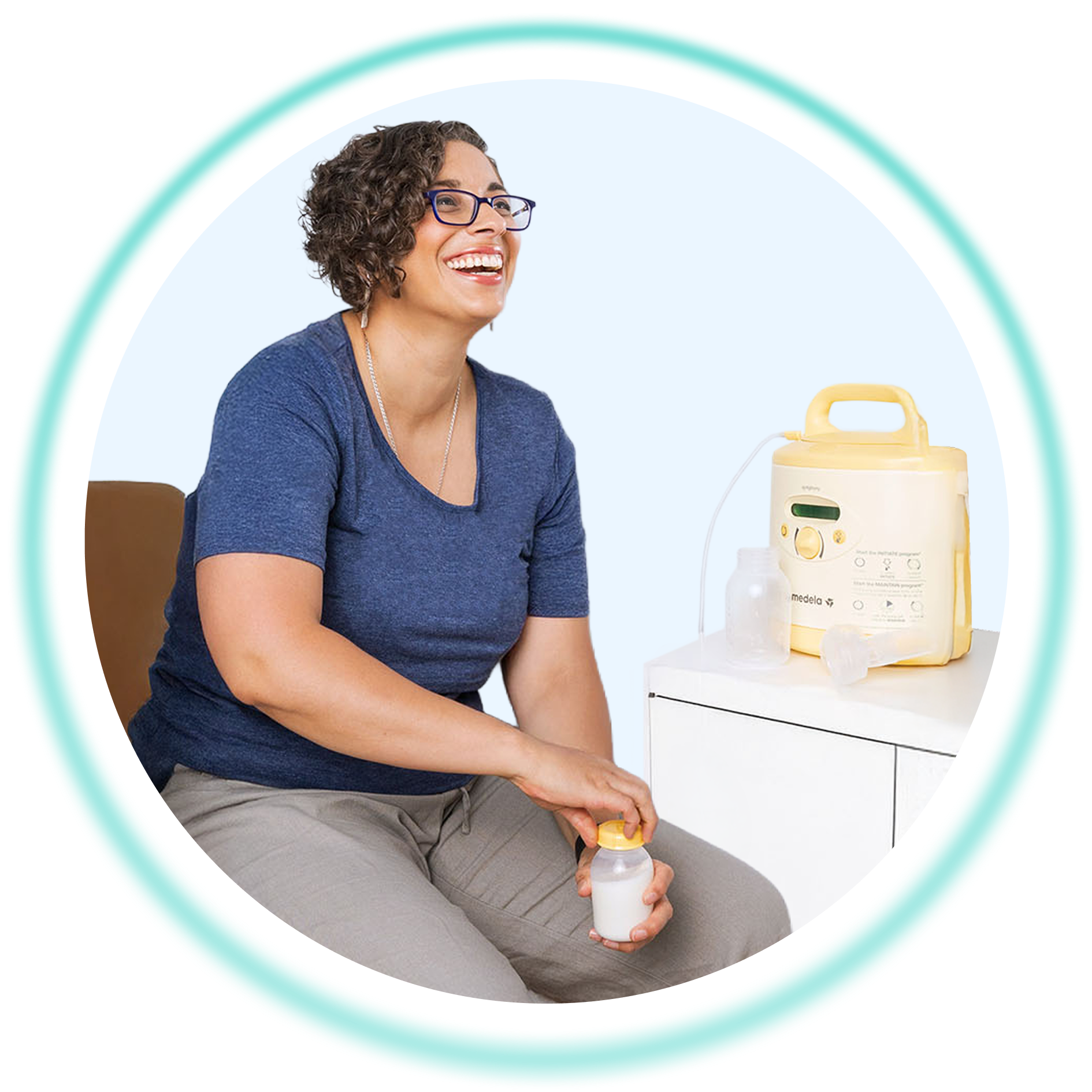 Woman holding pumped breast milk in bottle with using lactation Rooms