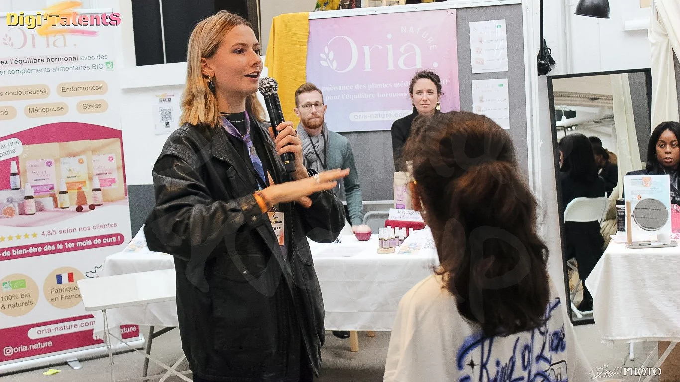 Une porteuse de projet partage son initiative avec le public