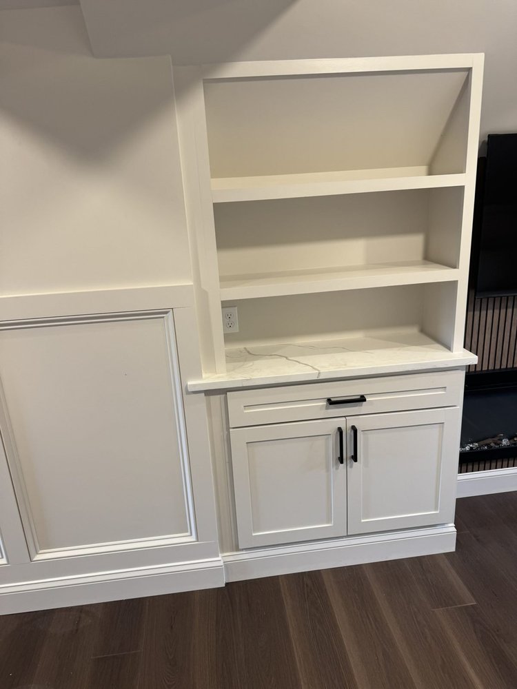 Built-in cabinet with quartz top and shelves – Hilltown, PA attic playroom