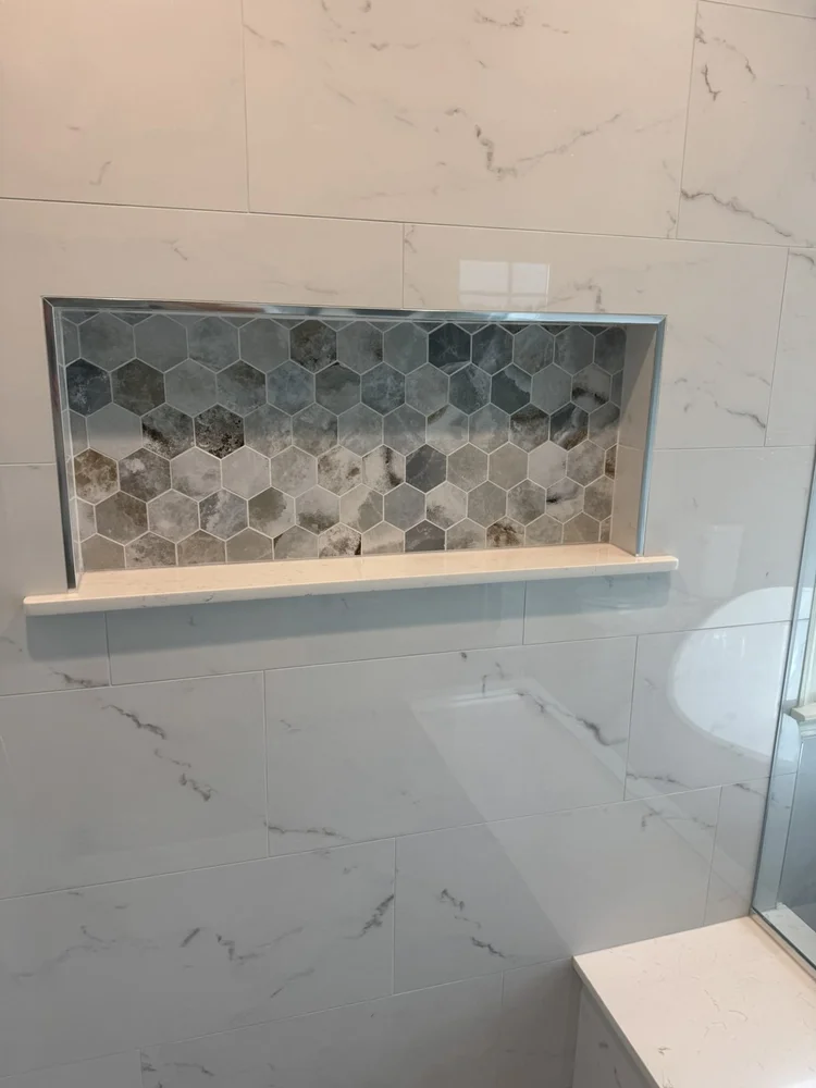 Shower niche with pebble hex tile accent and quartz sill – Hatfield, PA primary bathroom remodel
