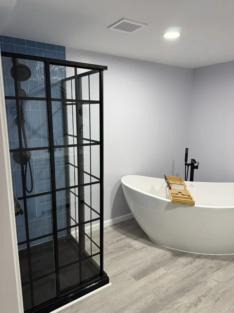 Corner shower and Kohler freestanding tub – North Wales, PA basement remodel