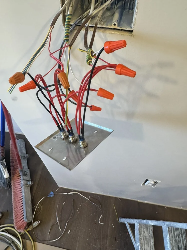 Wiring the push buttons for the hidden storage – Hilltown, PA attic playroom