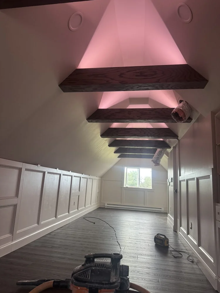 Multi-color LED lighting above the oak beams – Hilltown, PA attic playroom