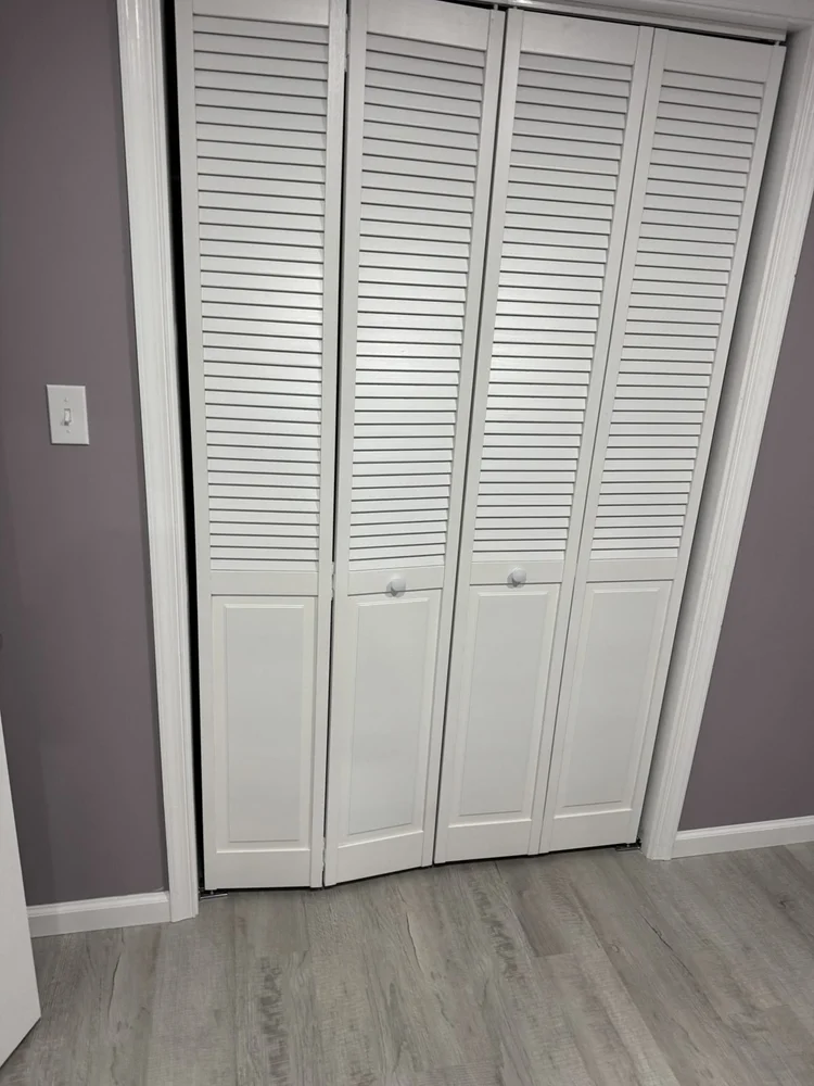 Storage closet with louvered bifold doors – North Wales, PA basement remodel