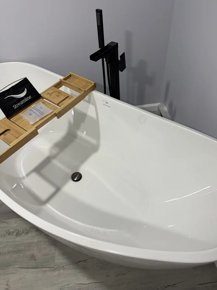 Kohler freestanding tub with black freestanding tub filler – North Wales, PA basement remodel