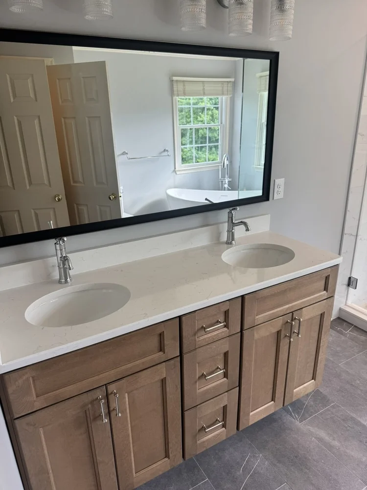 Vanity mirror reflecting the freestanding tub – Hatfield, PA primary bathroom remodel