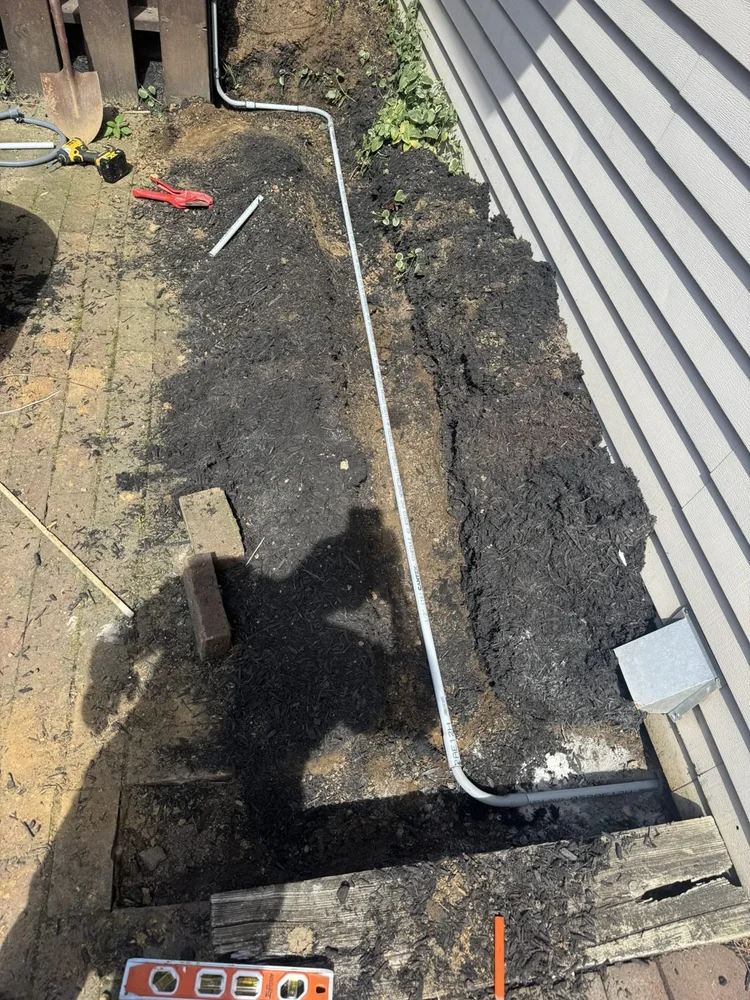 Buried conduit run to the mini split – Lower Macungie, PA four season room