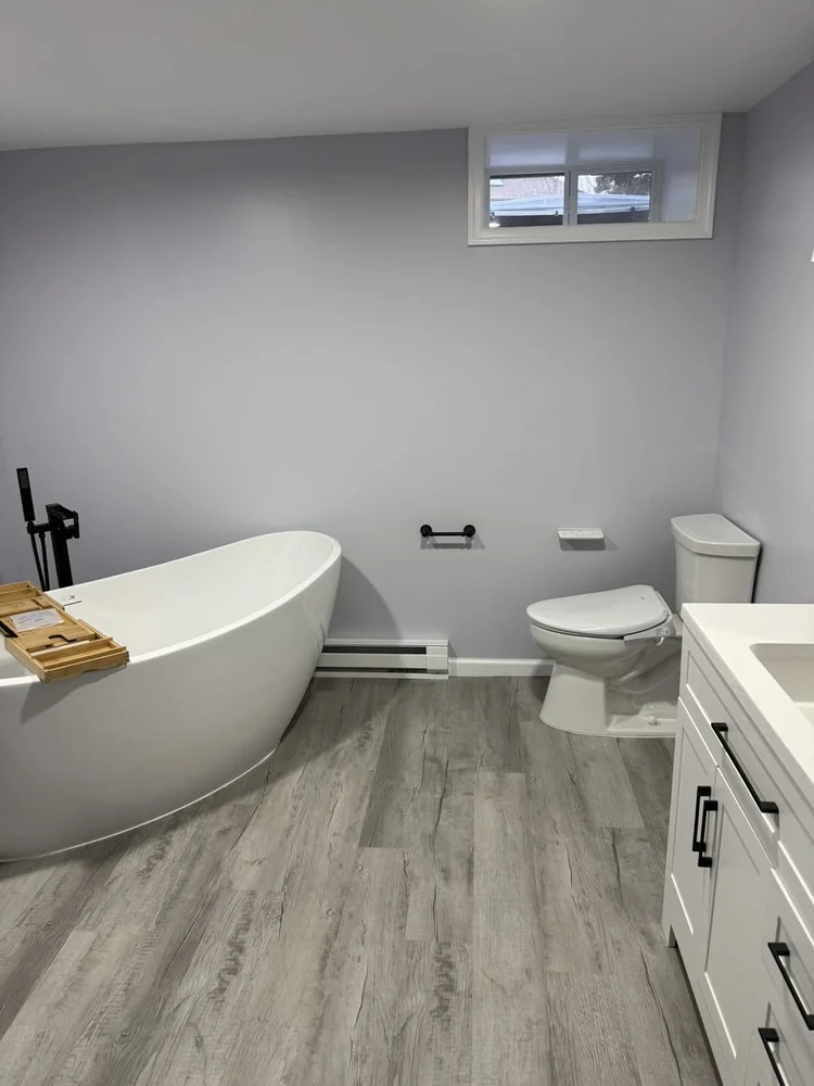 Freestanding tub, TOTO bidet toilet and 36-inch vanity – North Wales, PA basement remodel