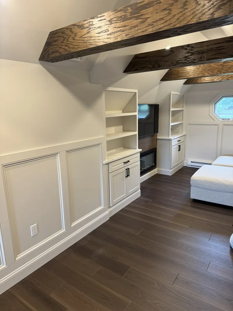 Shadow box wainscoting leading to the built-ins – Hilltown, PA attic playroom