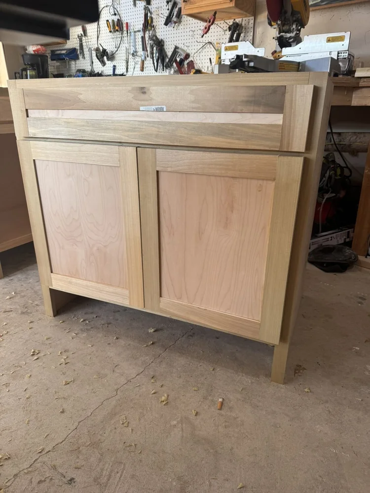 Custom cabinet with doors before paint – Hilltown, PA attic playroom