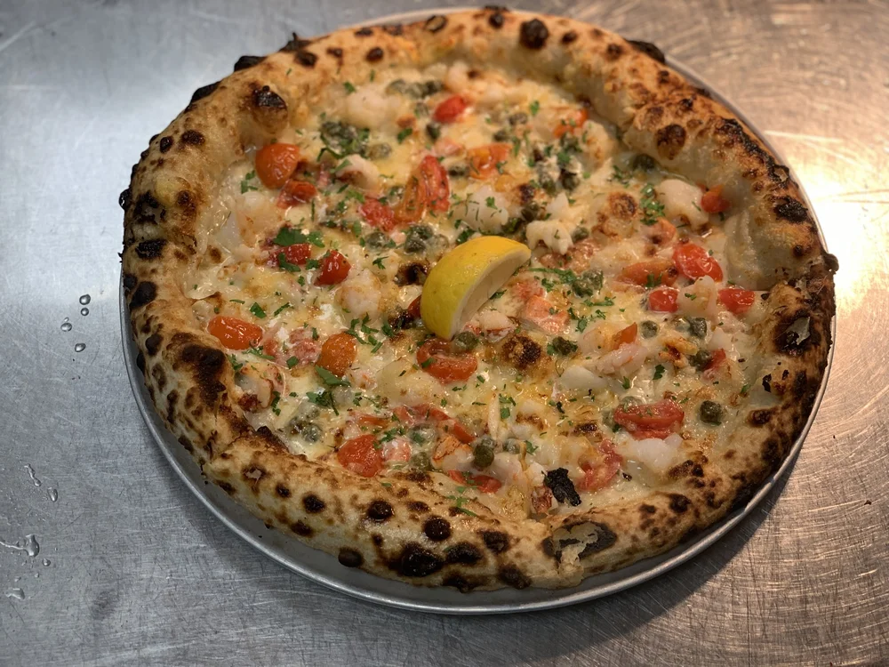 Brick oven lobster pizza at Hudson Social