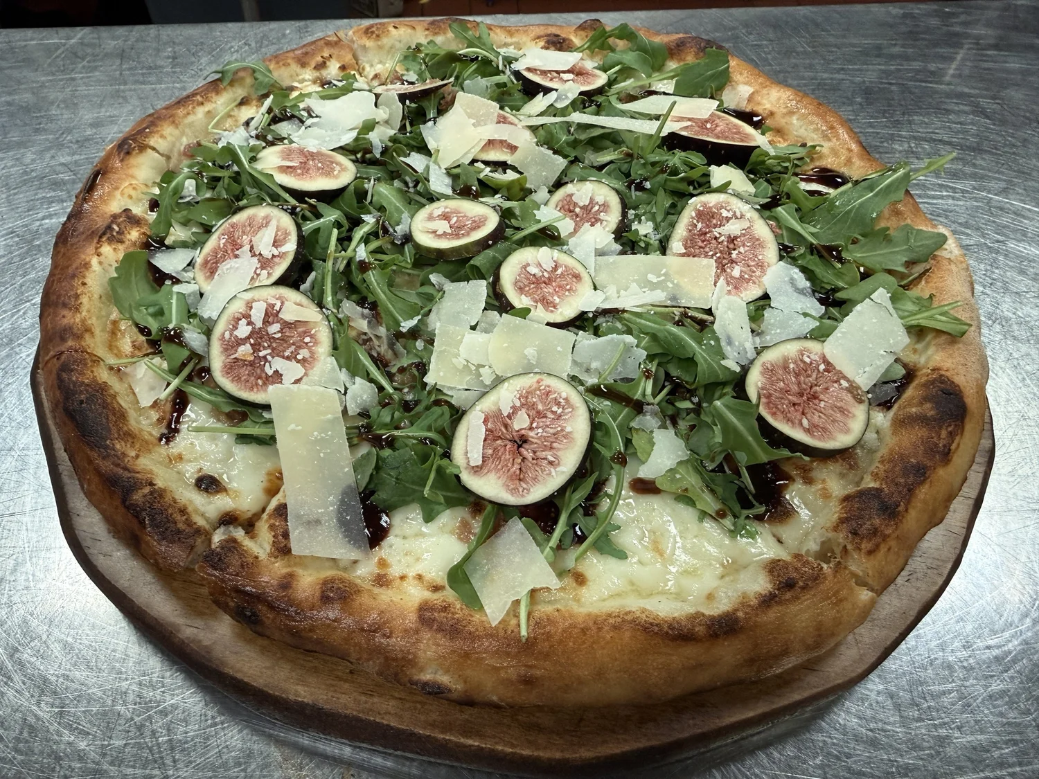 Fig and arugula brick oven pizza at Hudson Social