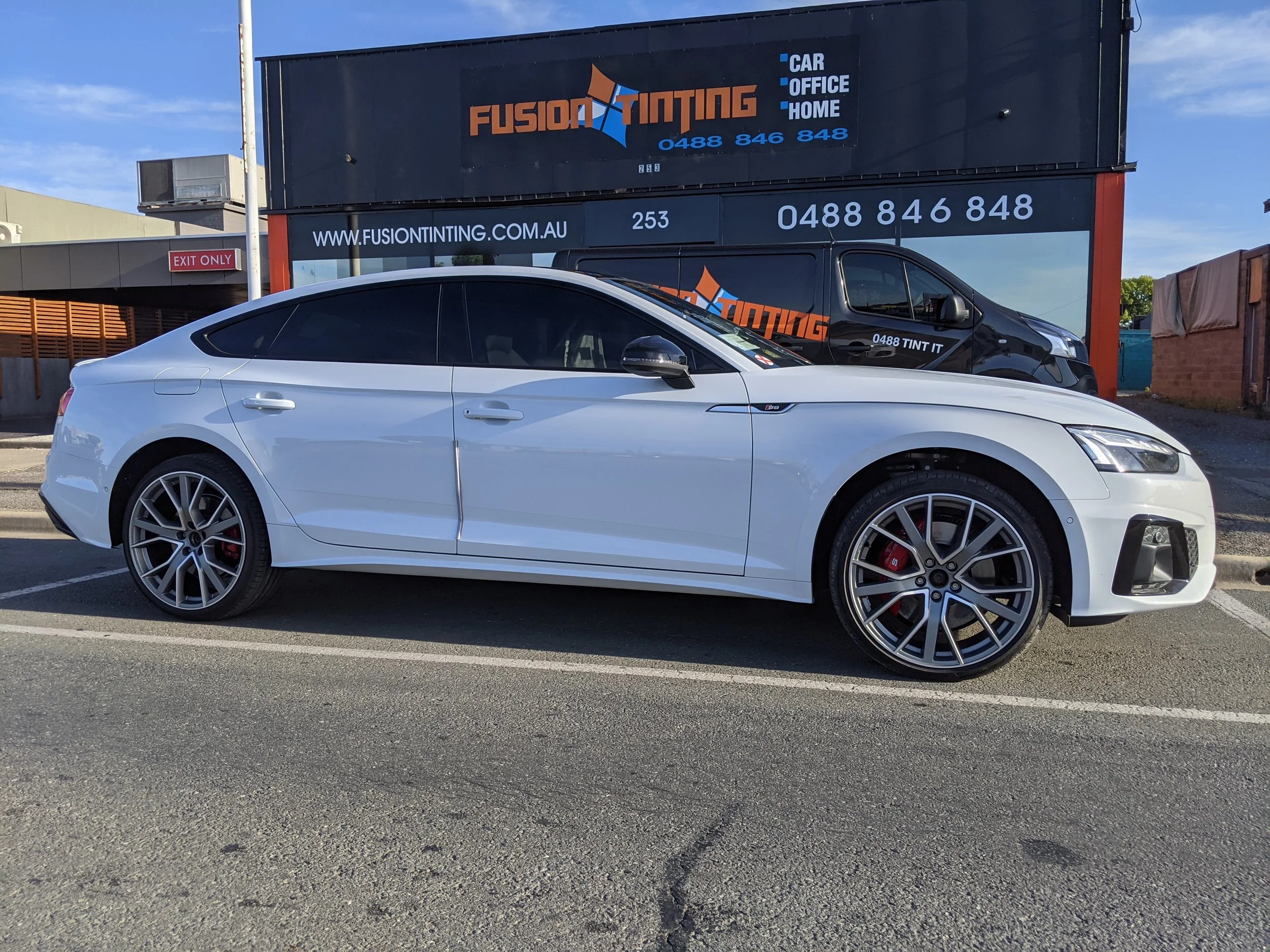 Automotive window tinting