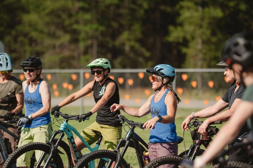 Woman mountain biking on a women's MTB retreat