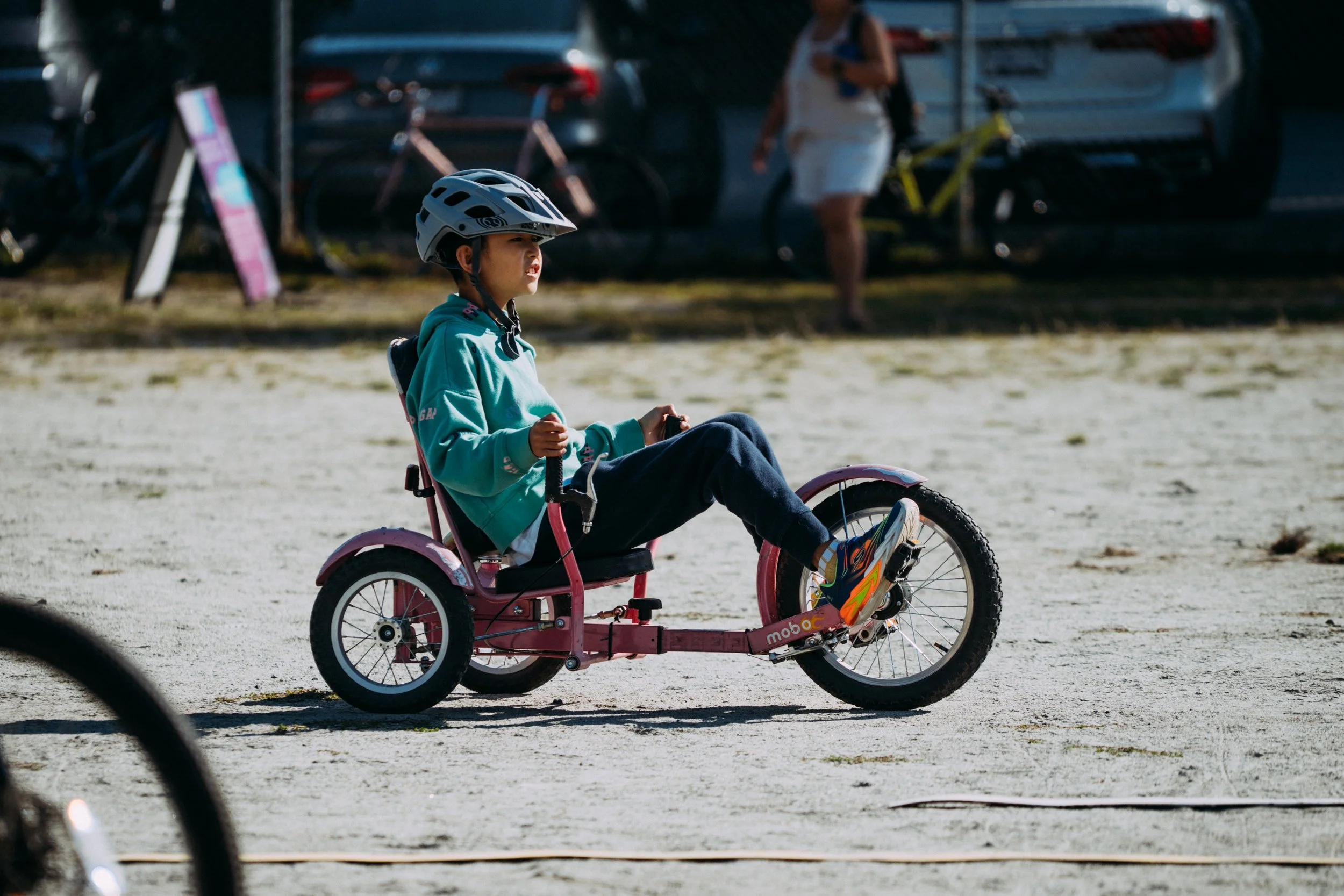 Students learning to ride bikes at school