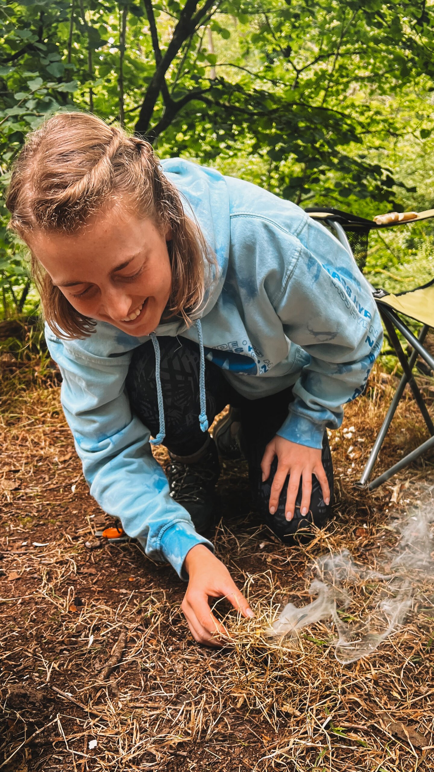 Women in the forest at an Into the Woods bushcraft program in BC