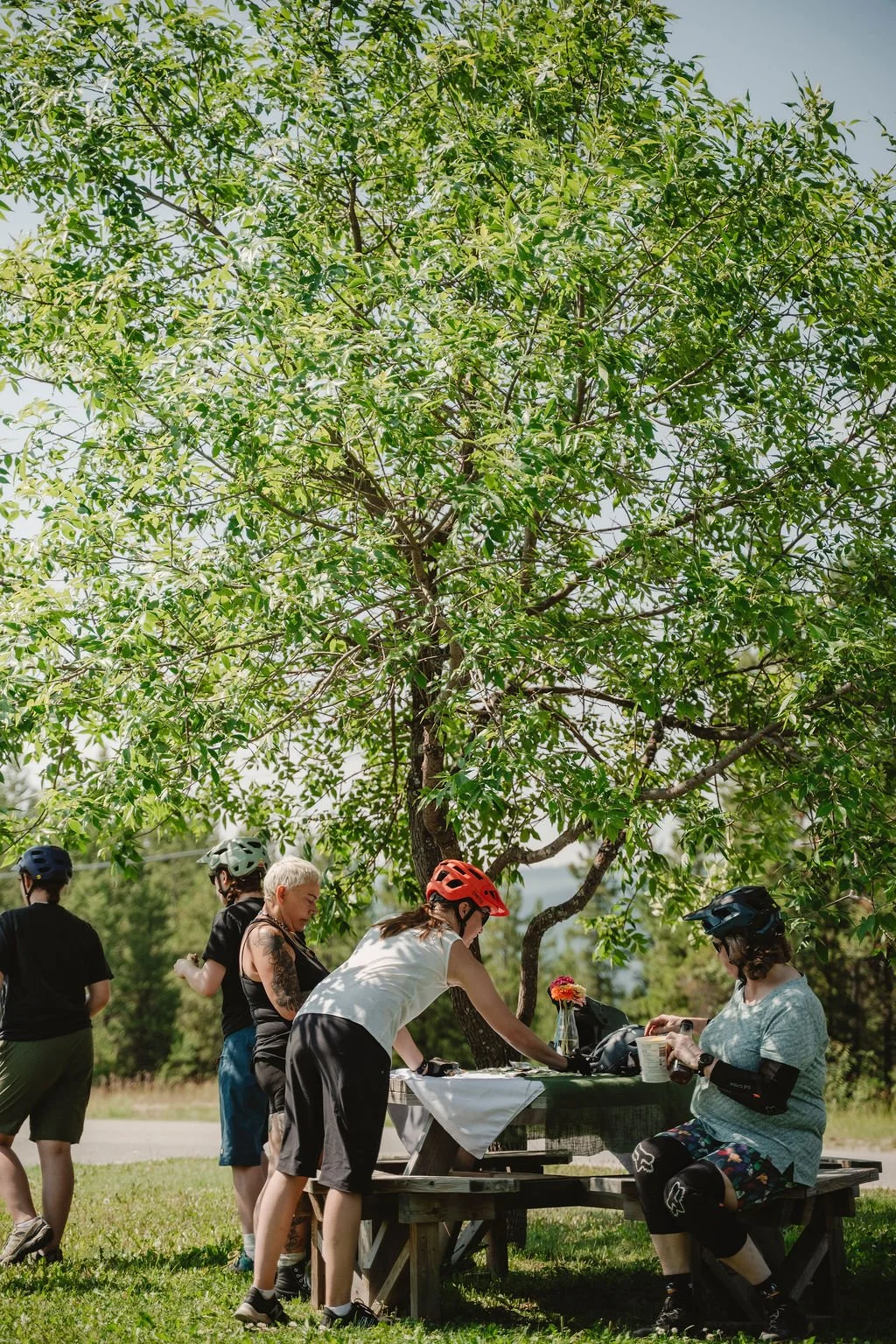 Women grabbing snacks at the food table