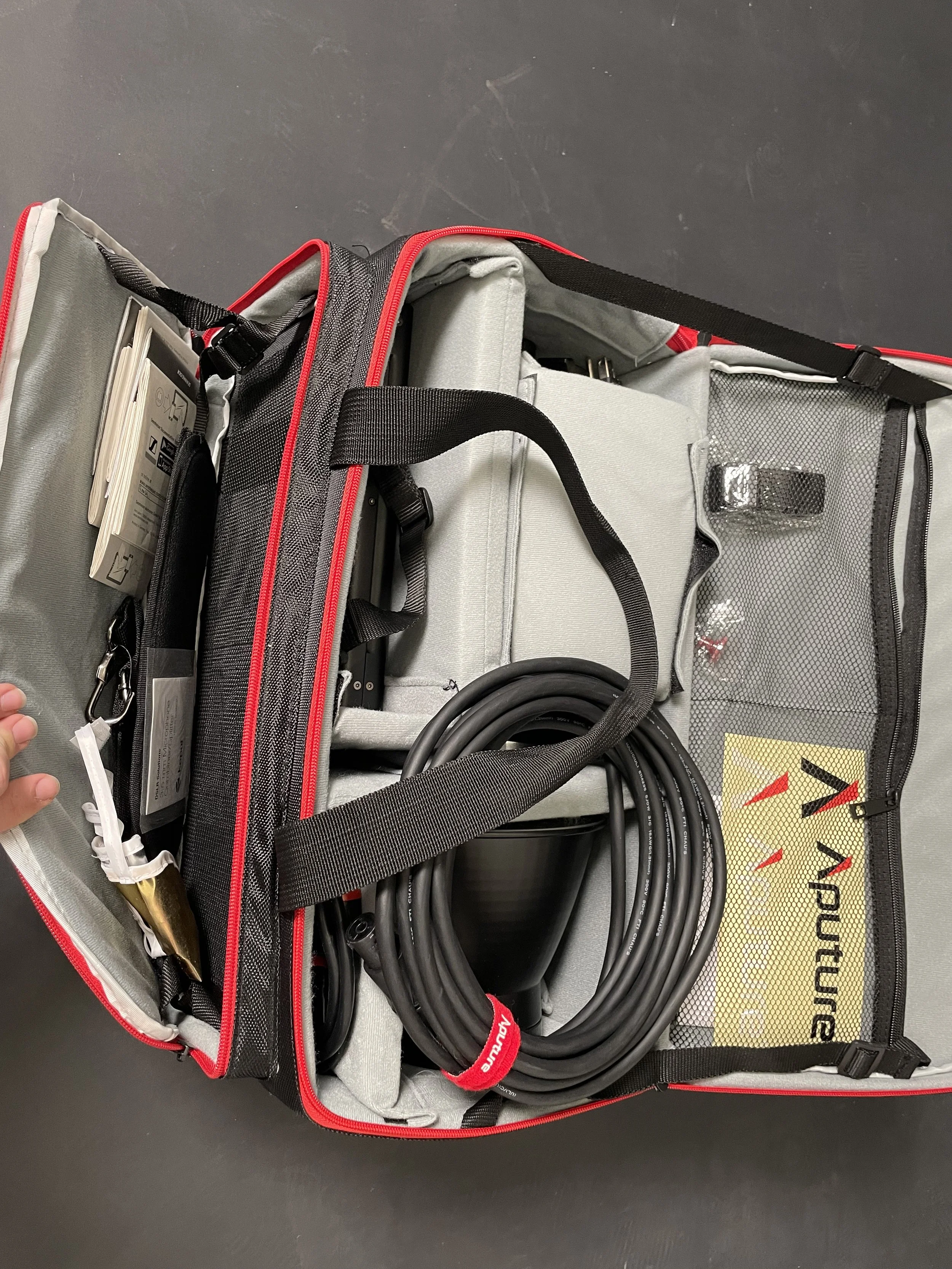 Aputure kit and case compartments. Confirm the exact included components.