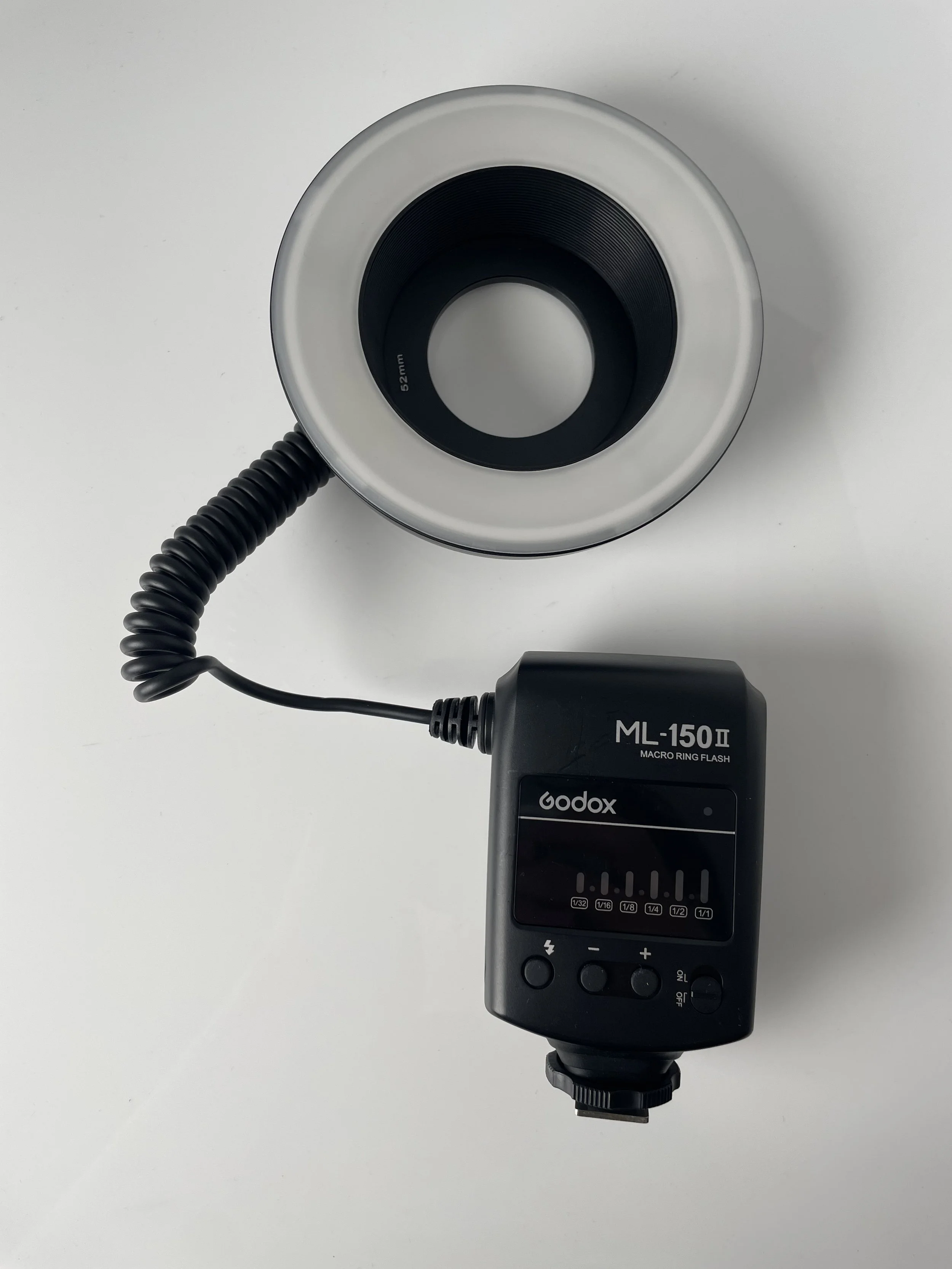 Godox ML-150 II ring flash, front. Confirm compatibility and included adapters.