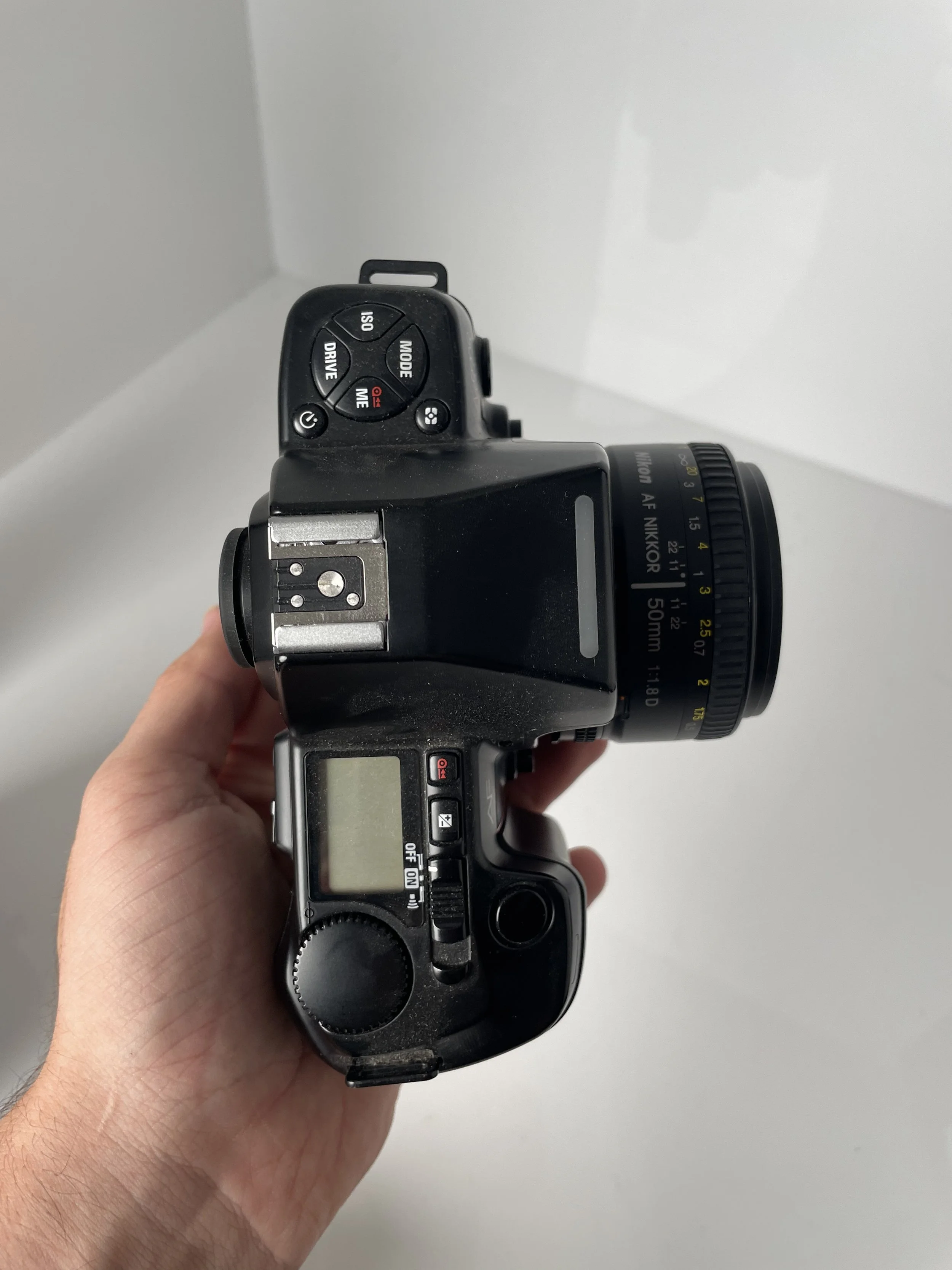 Nikon N8008 and 50mm lens, top view. Body untested.