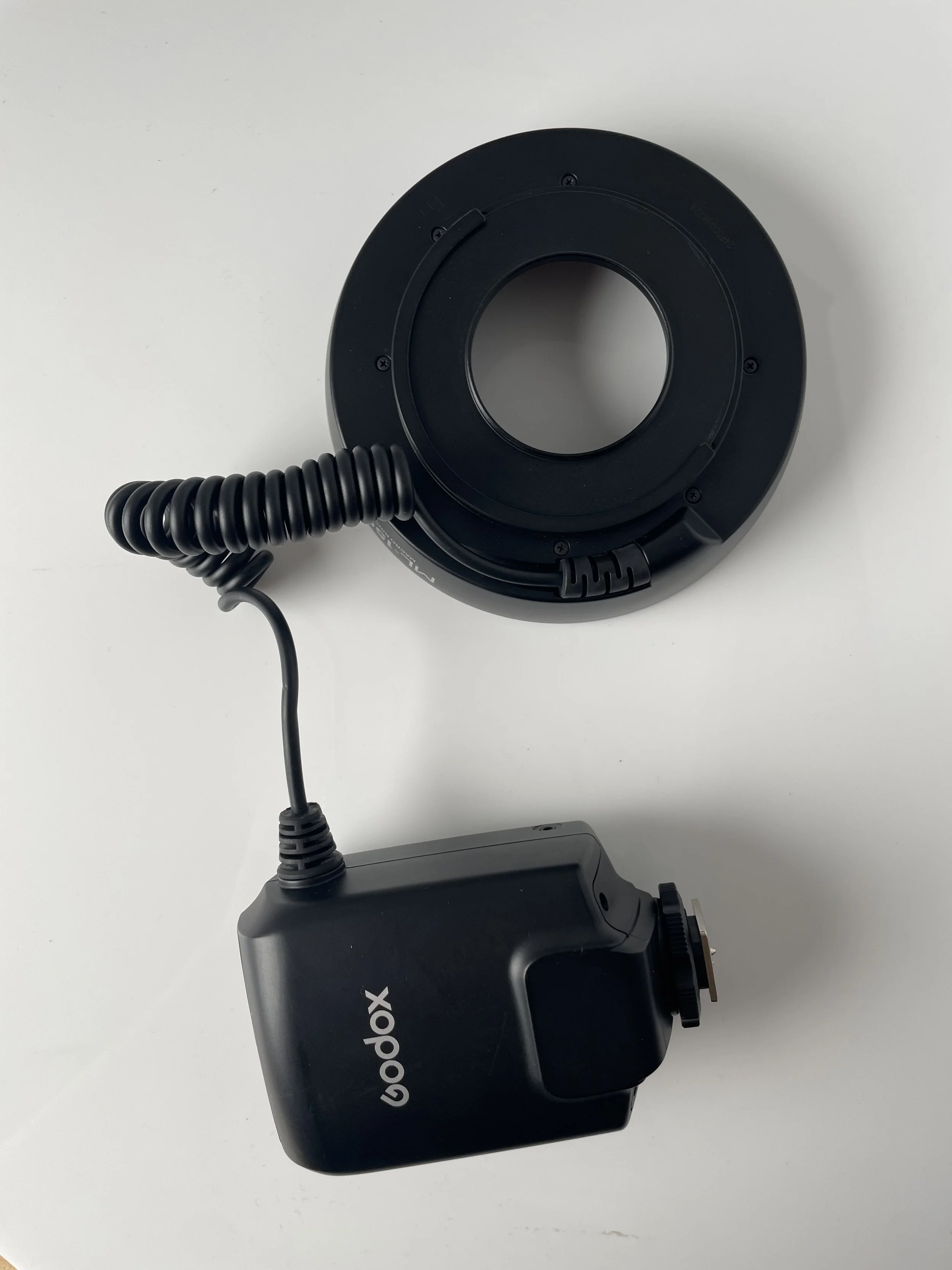 Godox ML-150 II ring flash, reverse. Confirm compatibility and included adapters.
