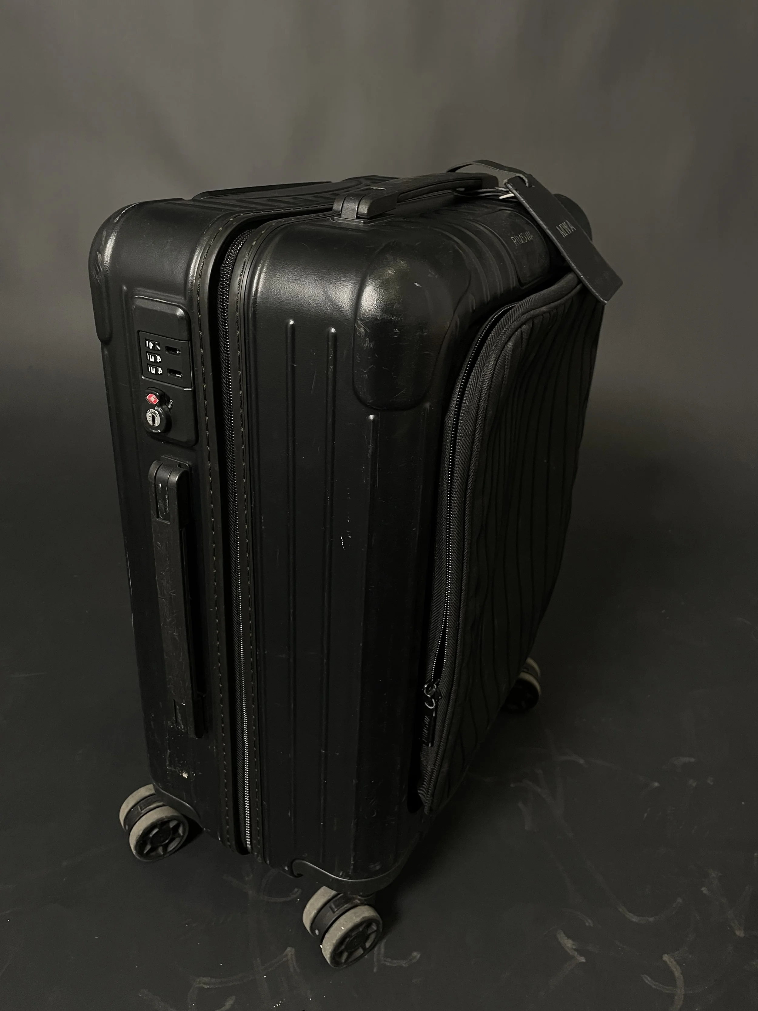 RIMOWA black rolling suitcase — IMG_2312