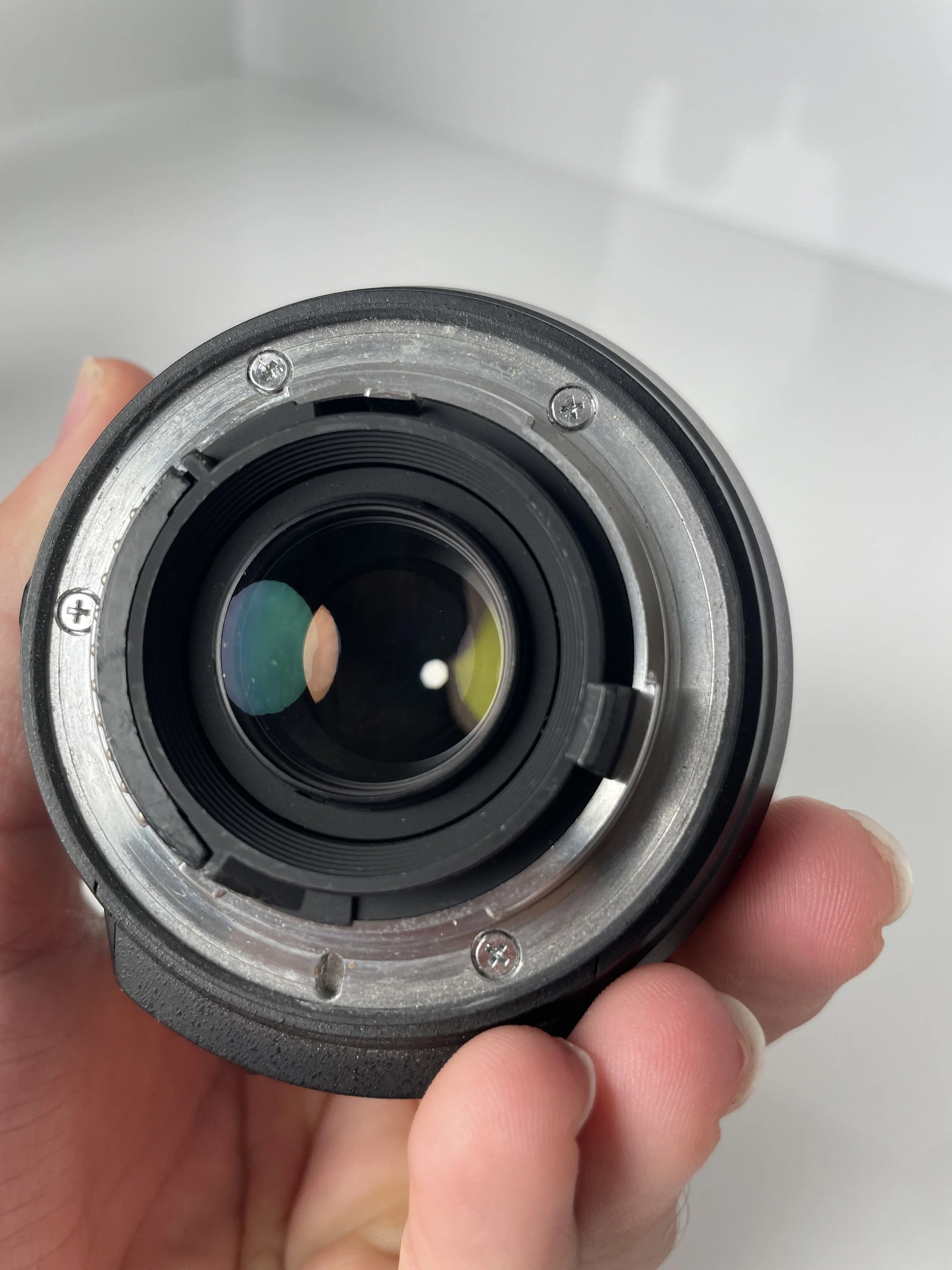 Nikon 18–200mm, rear mount and element.