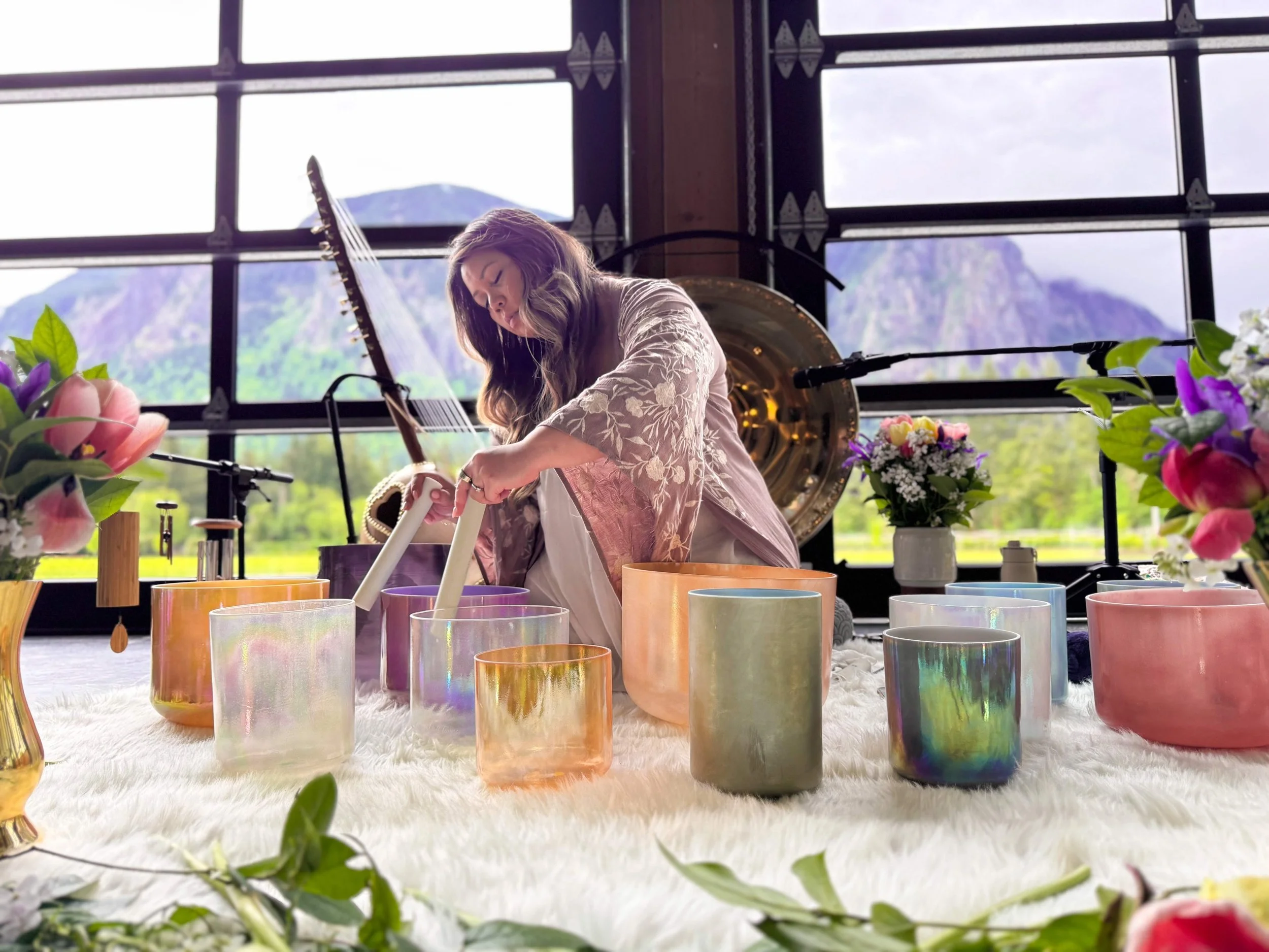 Jamie with crystal alchemy singing bowls
