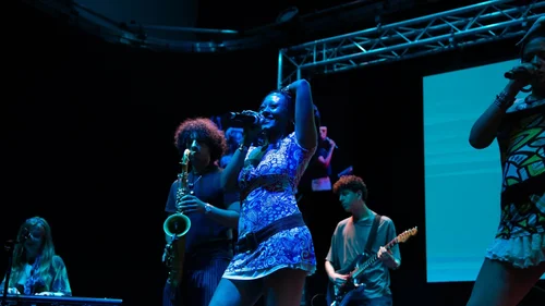 ELAM students performing live as a band on stage