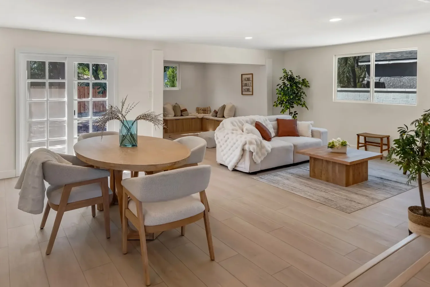 Bright staged living and dining space prepared for sale