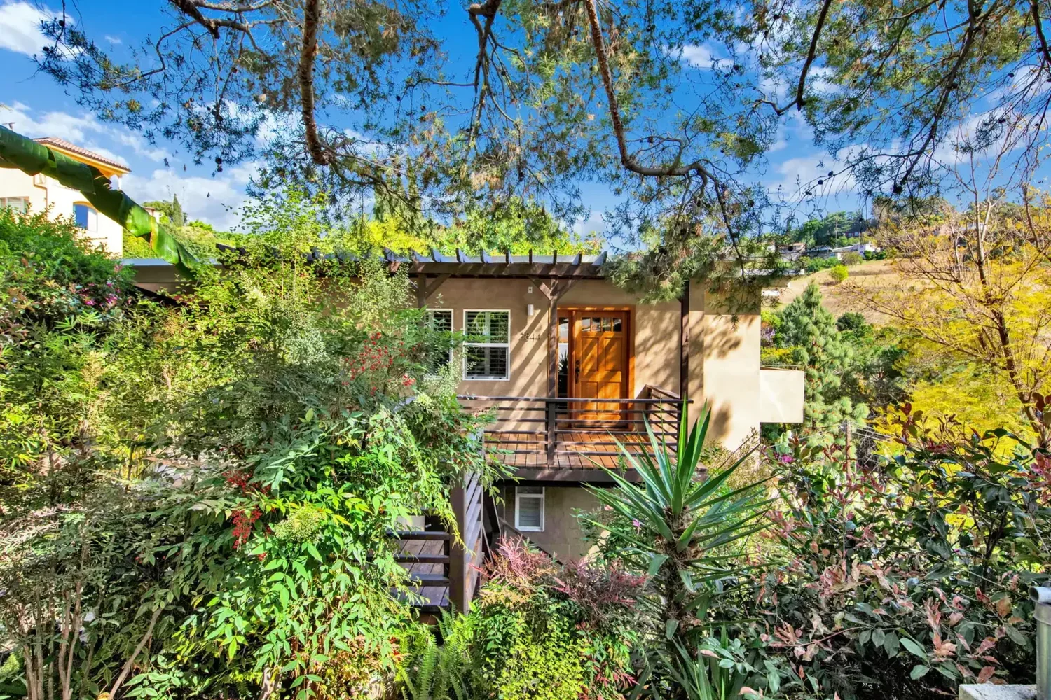 Los Angeles hillside residential property surrounded by mature trees