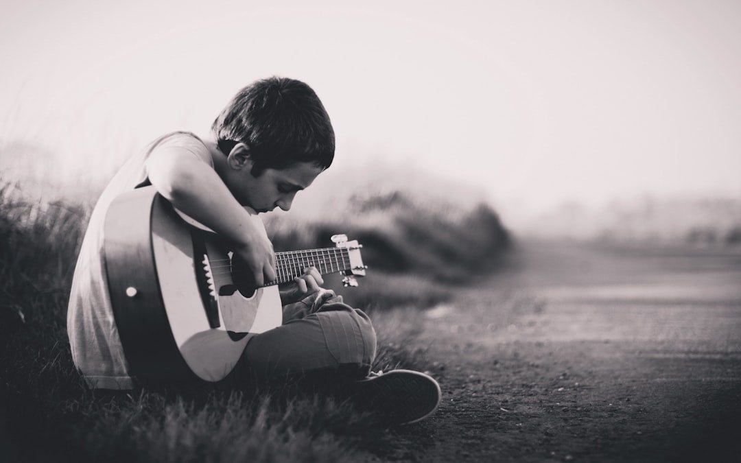 Rhythmic Resilience: Nurturing Intelligence in Kids through Guitar Education