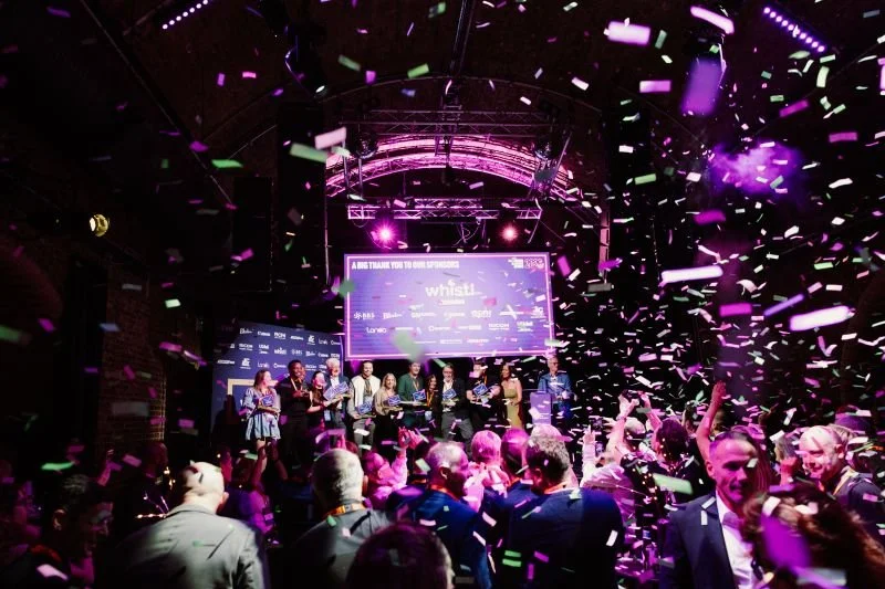 Confetti over the stage and the crowd at The Strategic Mailing Partnership awards.