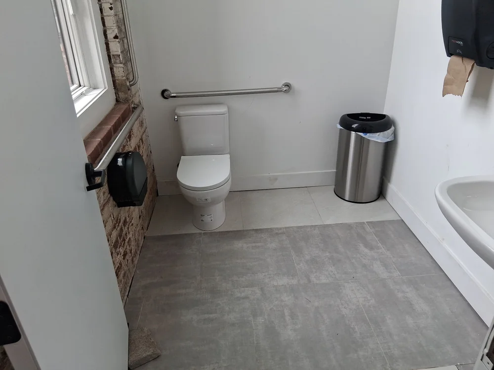 Accessible restroom with grab bars at D Street Studios, Philadelphia