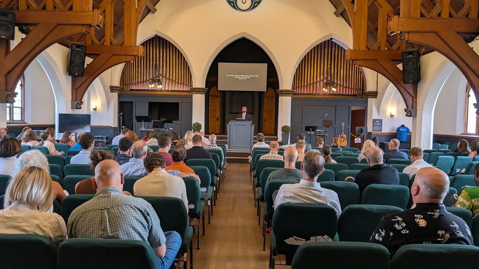 Congregation gathered for worship at Steel Valley Church, viewed from the back of the sanctuary