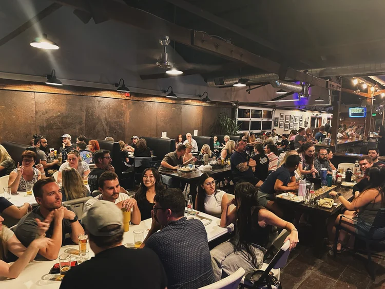 Packed taproom on DJ Trivia night at Gander Taphouse