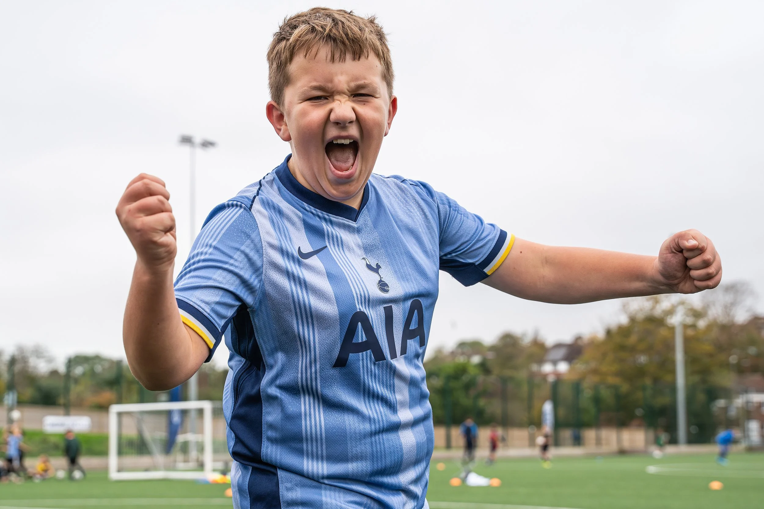 Young footballer celebrating during a Swerve Soccer camp in Hove