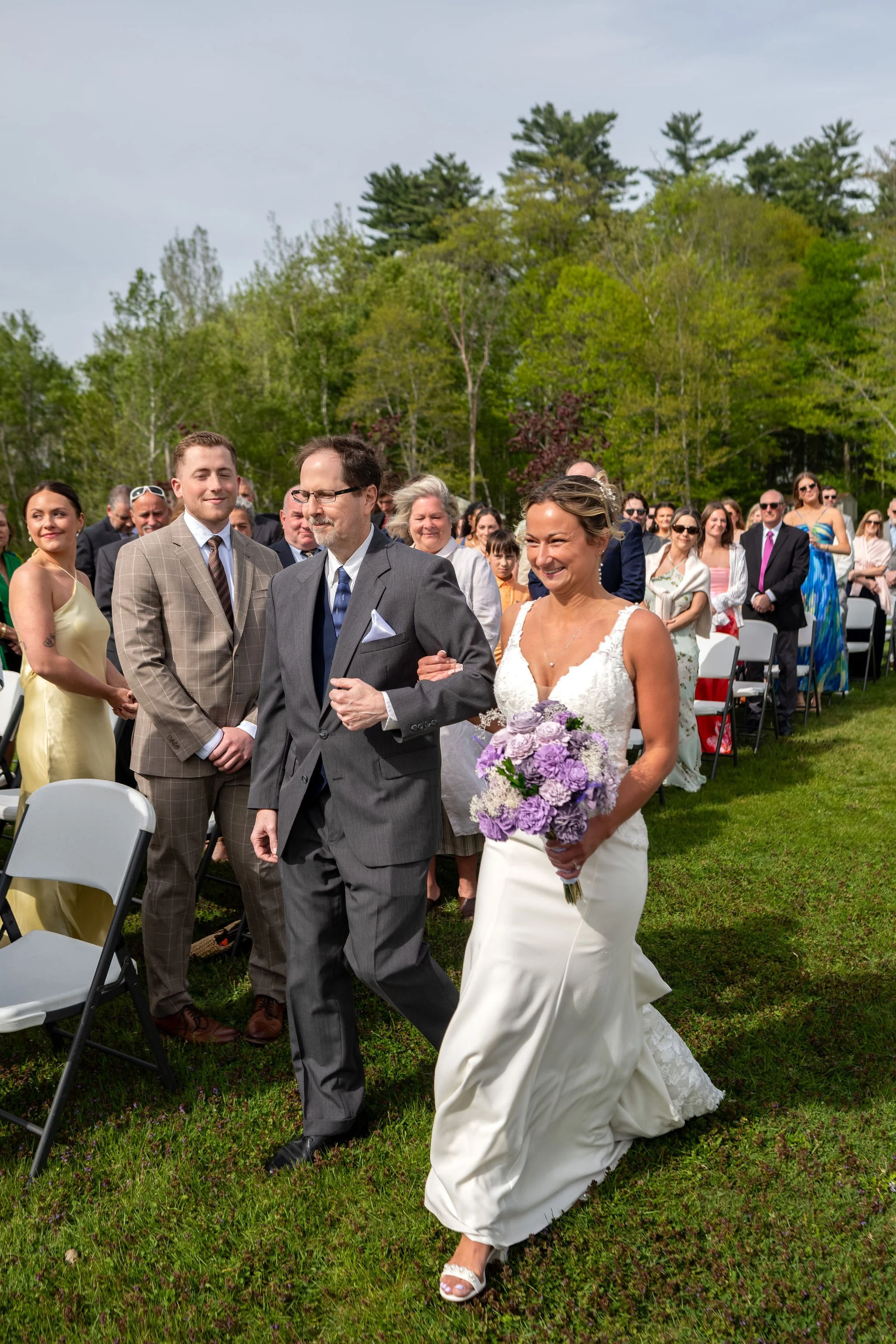 Beth and Cameron bride reading her vows during the ceremony at Augusta Country Club Manchester Maine spring wedding photography VMG Productions